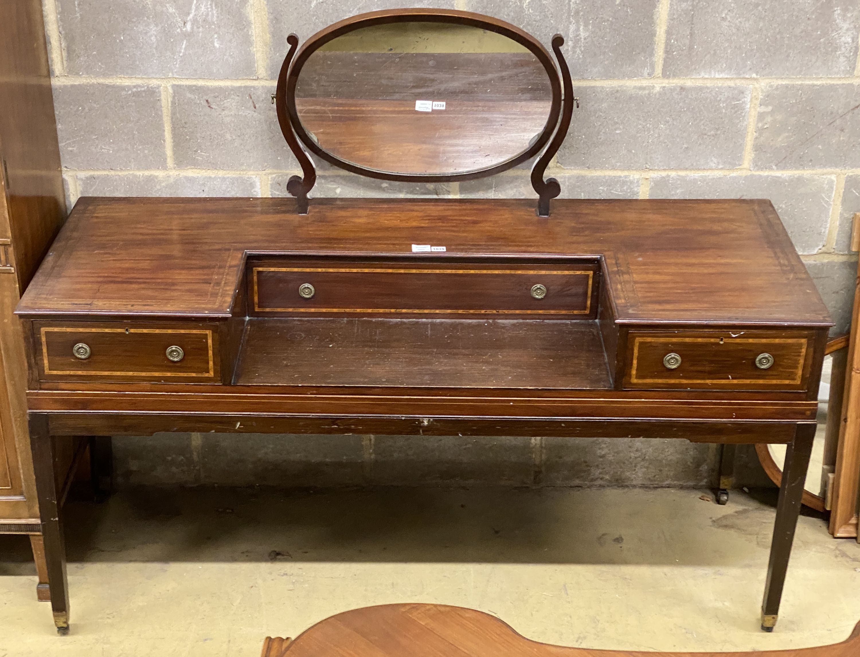 A mid 19th century mahogany dressing table, converted from a square piano